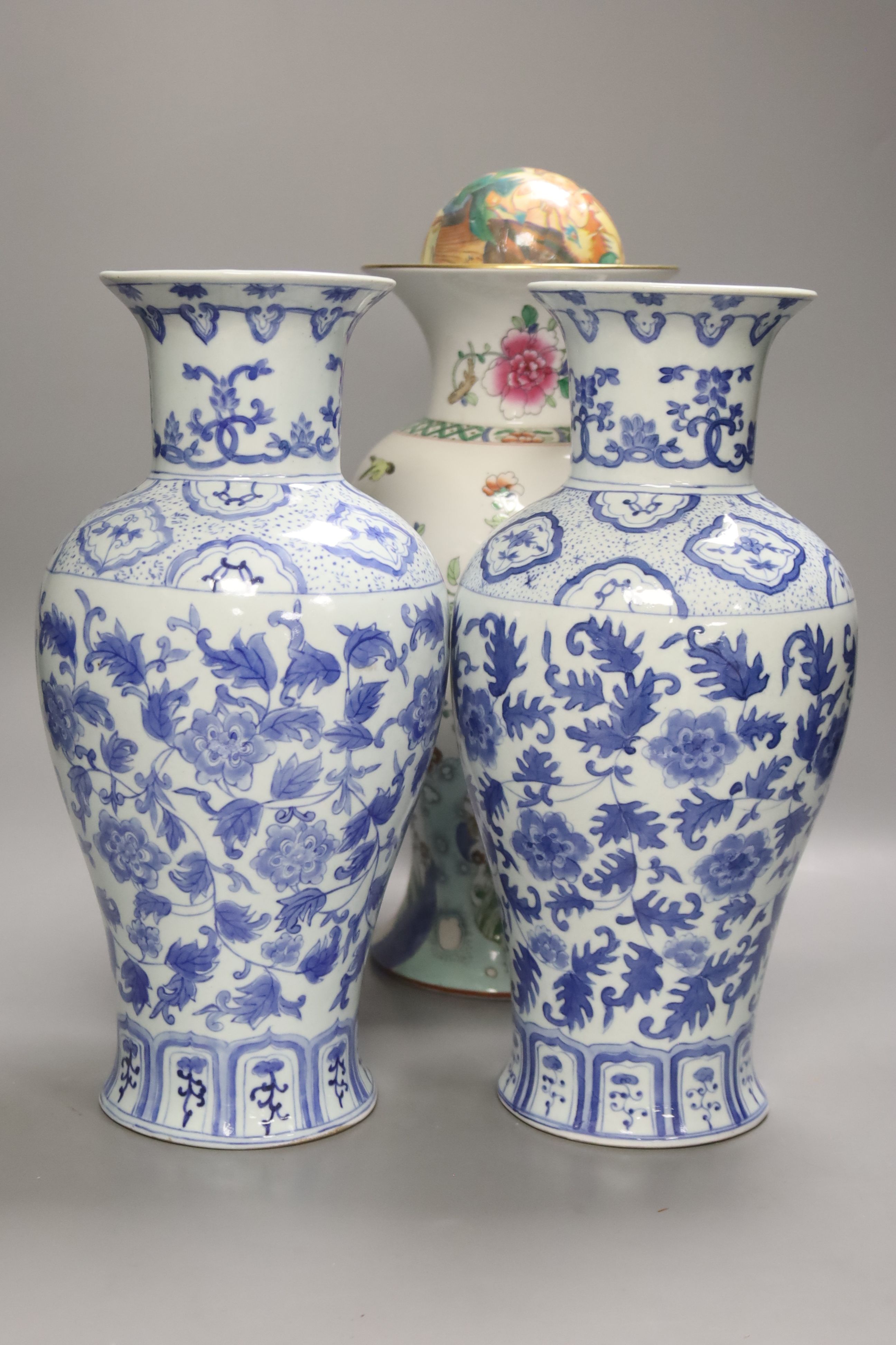 A pair of blue and white Chinese vases, height 31cm, and two others